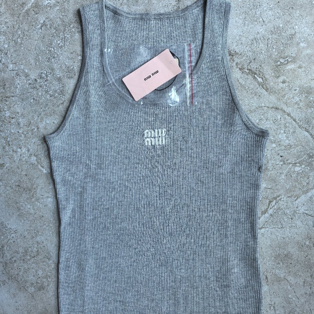 Miumiu's grey vest